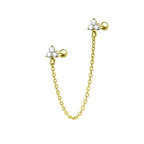 Piercing Trilumi con Catena